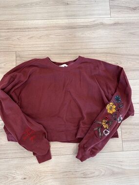 Spiritual Gangster Burgundy Cropped Sweatshirt with Floral Sleeve Embroidery